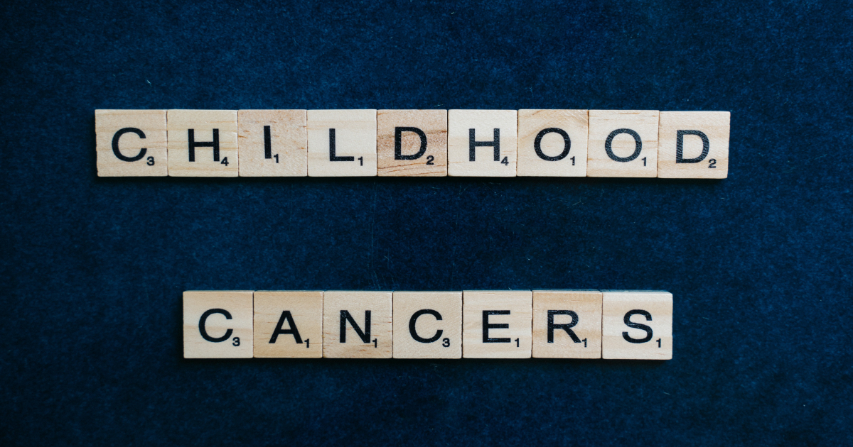 Scrabble tiles spelling out 'Childhood Cancers'